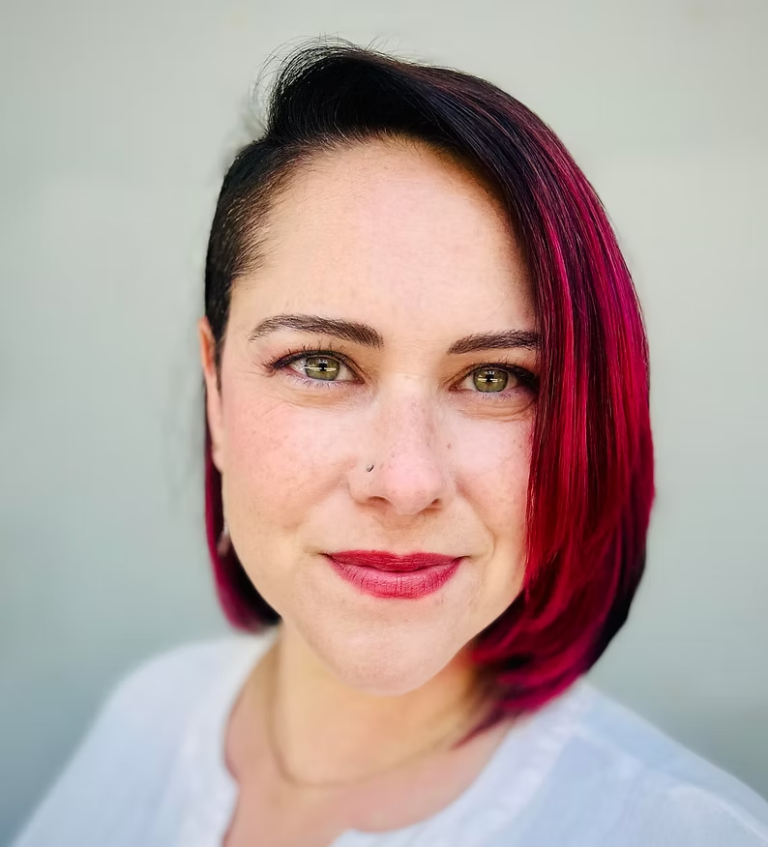 Headshot of Rebecca, BCBA & Marriage & Family Therapist, neurodiversity affirming therapist at Unitive Wellness Clinic.